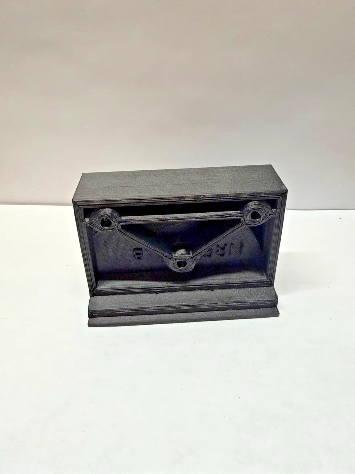 Rear mounting side of the NRP-CHB-001 lower door catch housing