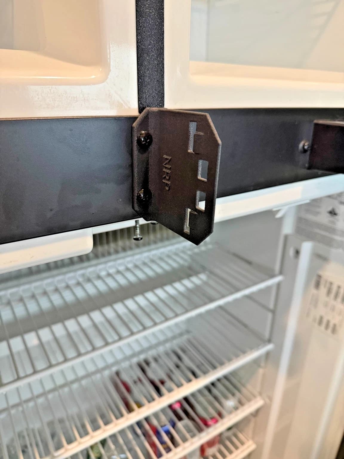NRP-SP-001 refrigerator flapper strike plate installed